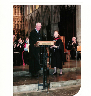 photograph of margaret phillips receiving a medal from the Royal College of Organists
